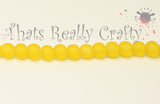 Sunflower Yellow Transparent Glass Round Beads 6mm Approx 70pcs. TRC230